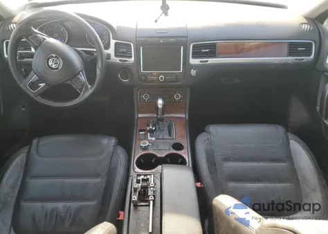 2013 Volkswagen Touareg V6 Tdi z USA, uszkodzony, nr VIN WVGEP9BP8DD006722